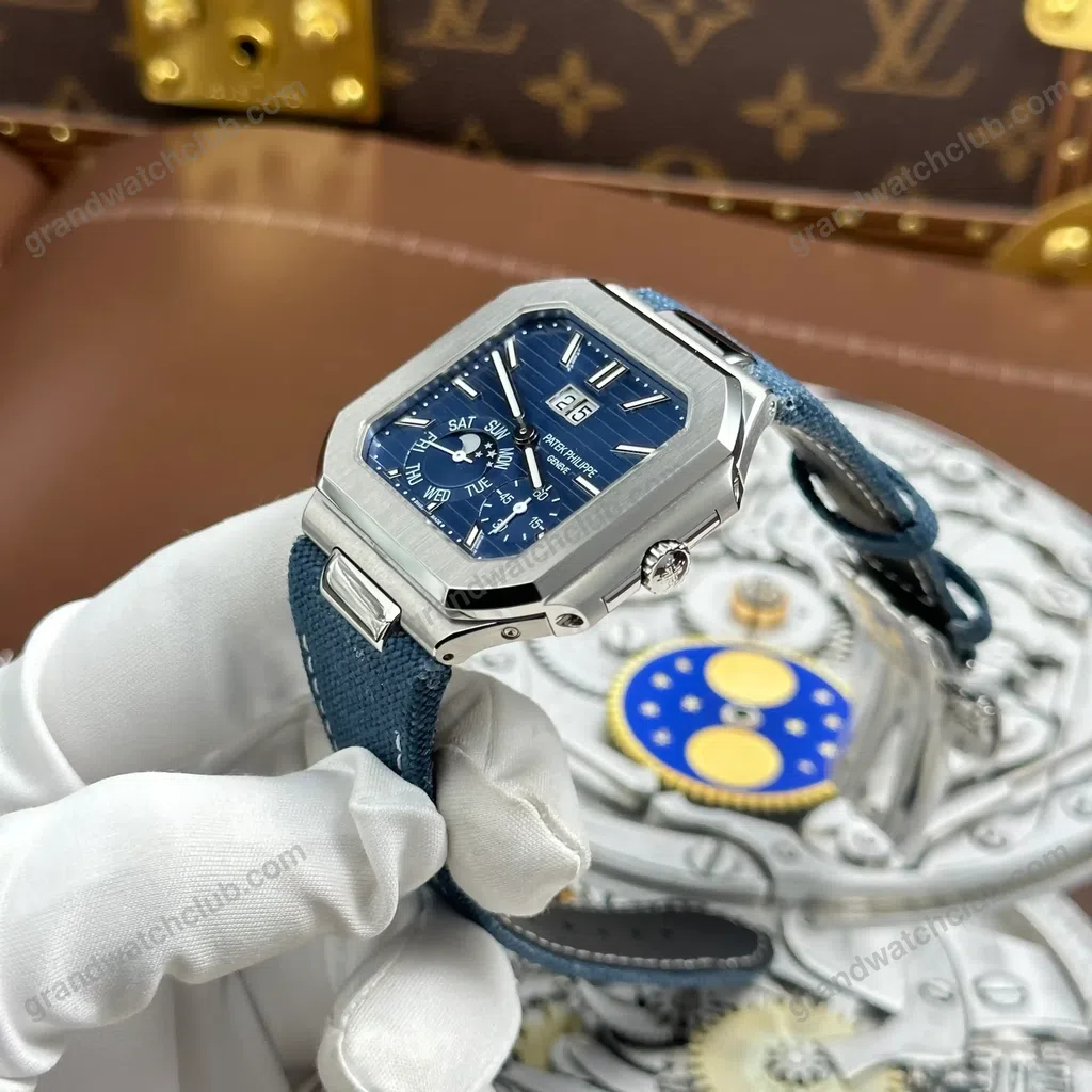 Super Clone Patek Philippe Cubitus 5822P-001 Platinum Instantaneous Grand Date Day Moon Phases — on leather display