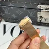 Super Clone Omega 42mm Gold — on leather display