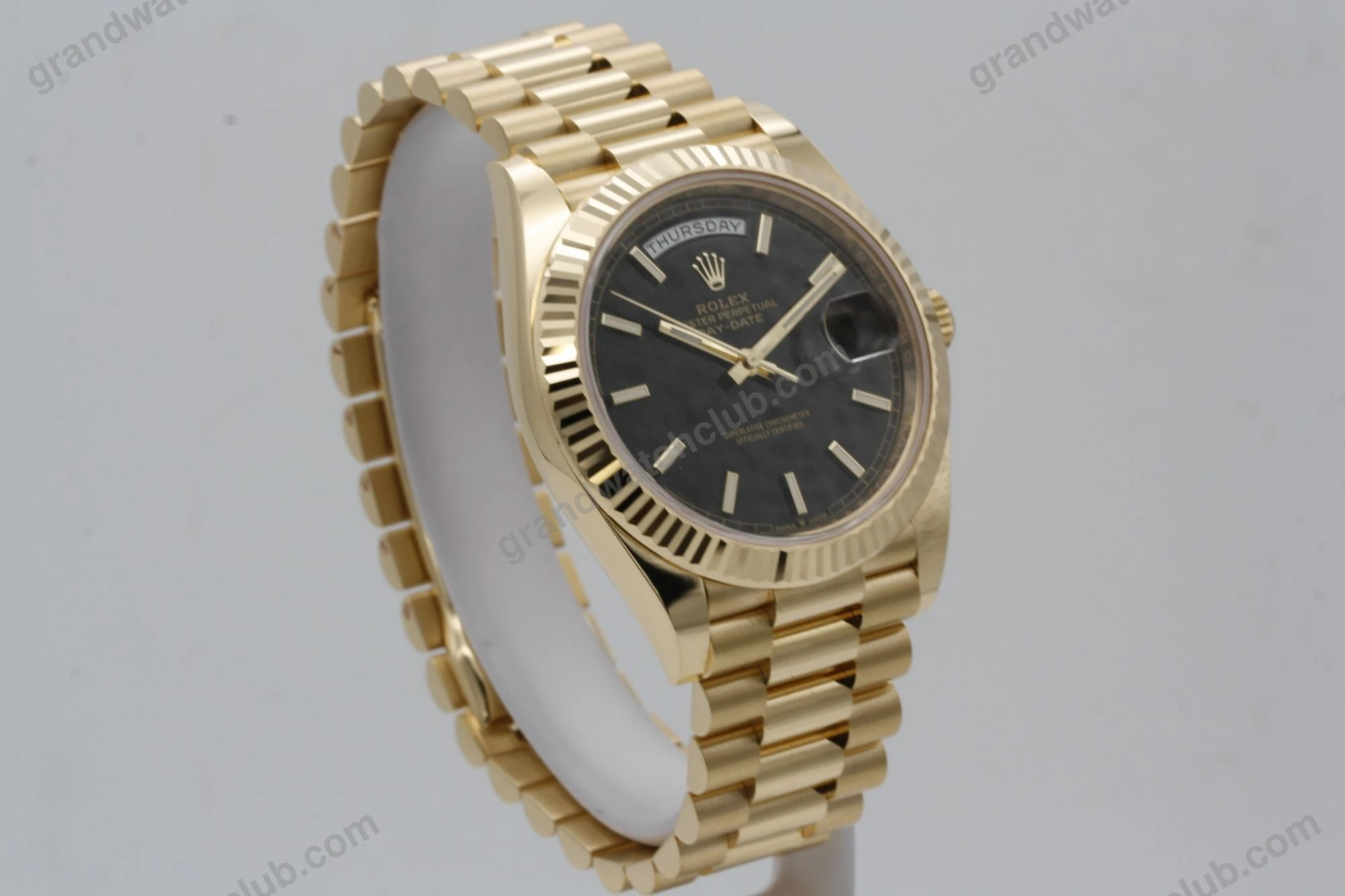 Super Clone Rolex Day-Date Black Dial 228238 40 mm — on leather display