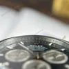 Super Clone Rolex Daytona black Dial 126519LN — on leather display