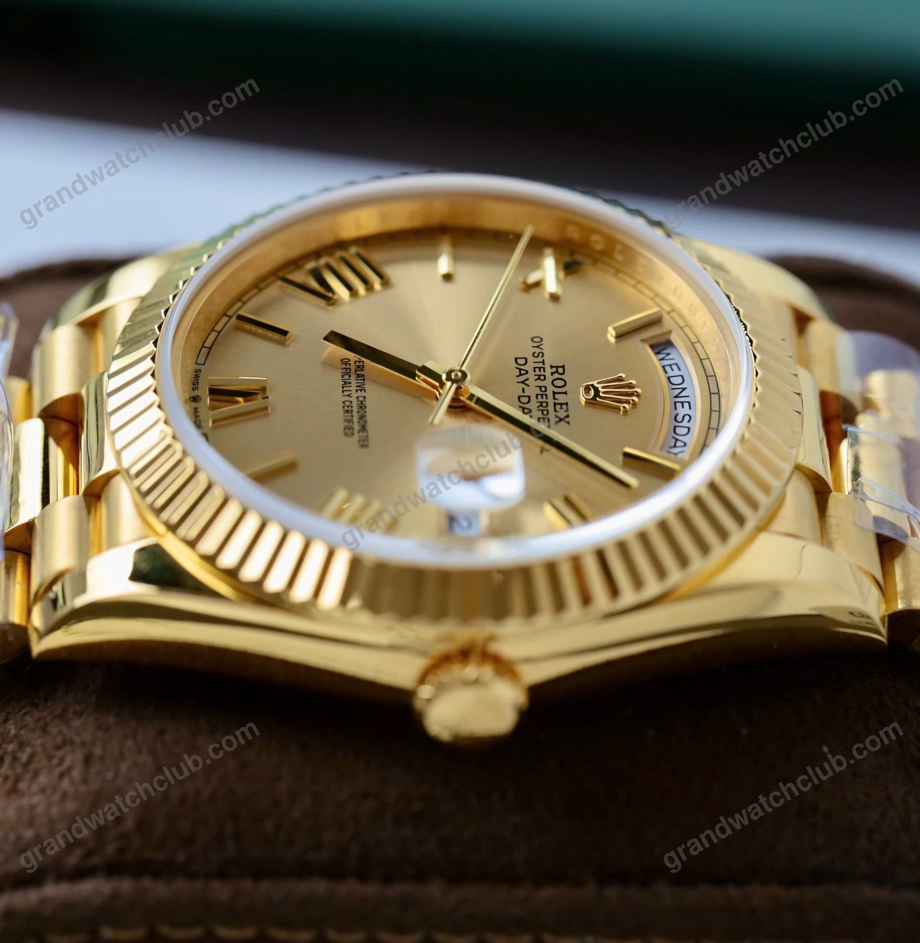 Super Clone Rolex Day-Date Roman Champagne Dial 228238 40 mm β on leather display