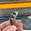 Super Clone Hublot Big Bang 42mm Rubber Strap Titanium — on leather display