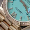 Super Clone Rolex Day-Date Turquoise Dial 128235 40 mm — on leather display